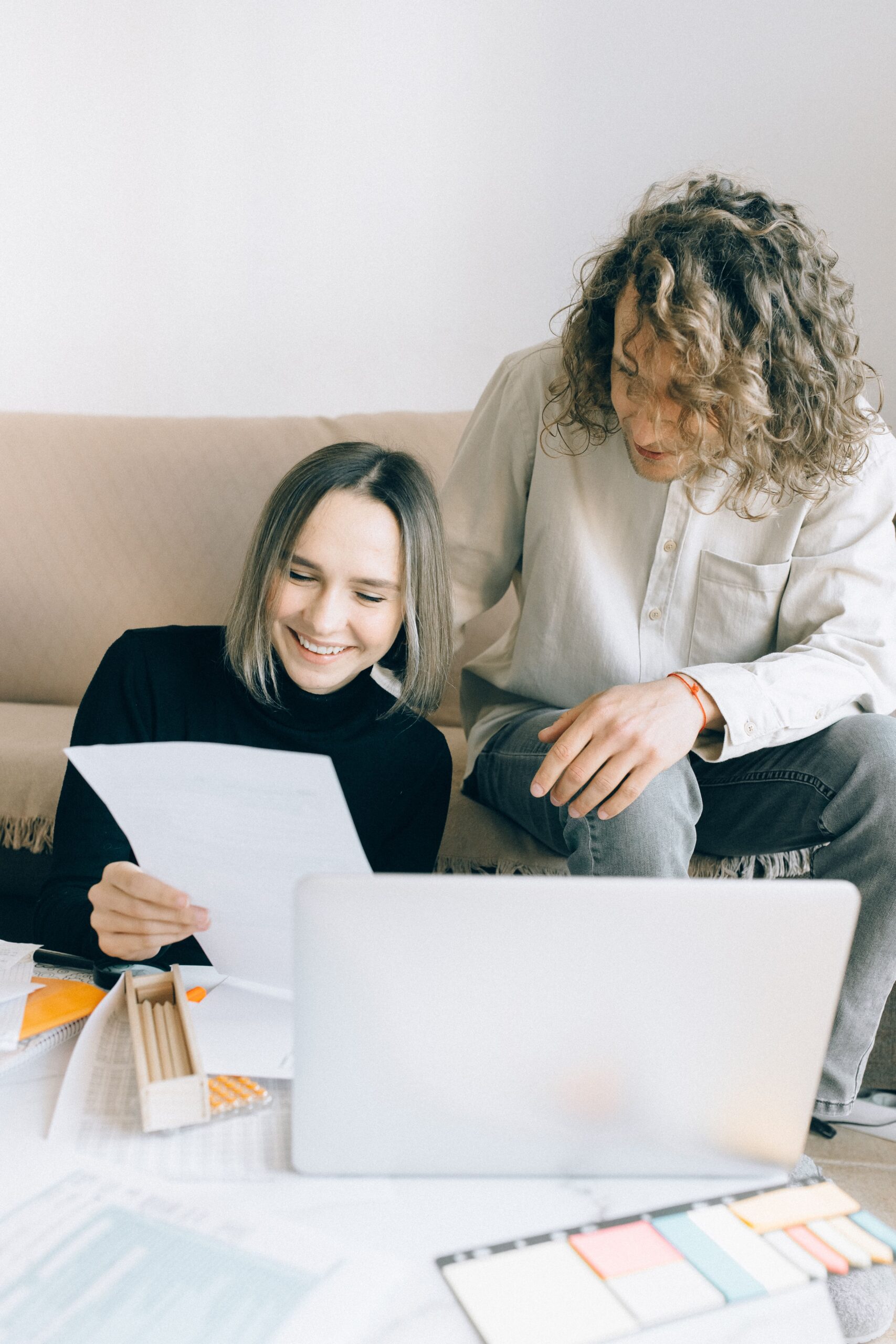 Couple reviewing their savings rates
